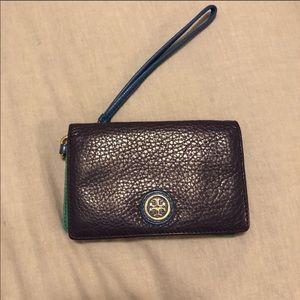 Wristlet by Tory Burch.